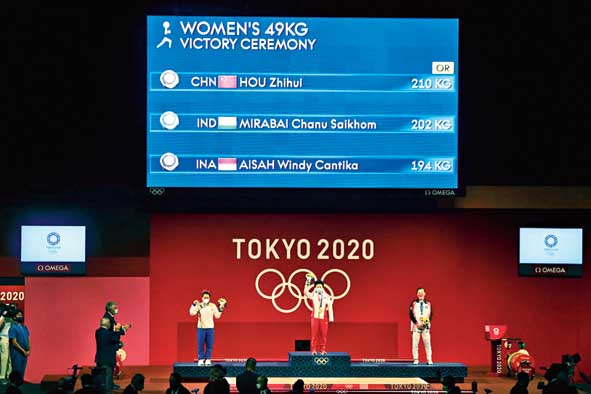 Mirabai Chanu Saikhom on the podium