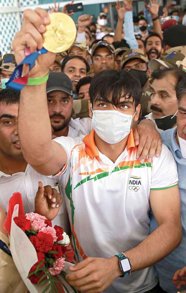 Gold medallist Neeraj Chopra on arrival at the airport.