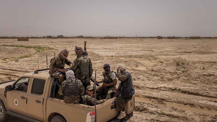 Militiamen in a pickup truck belonging to the Afghan National Army outside Mazar-i-Sharif, Afghanistan, on July 10, 2021.