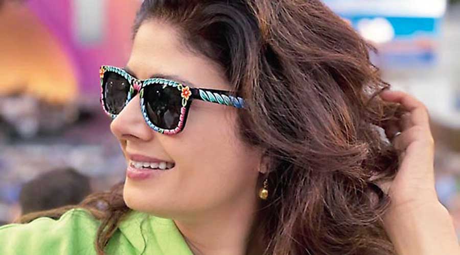 Pooja Batra cuts a stylish frame in Bibi Russell’s signature rickshaw art glasses