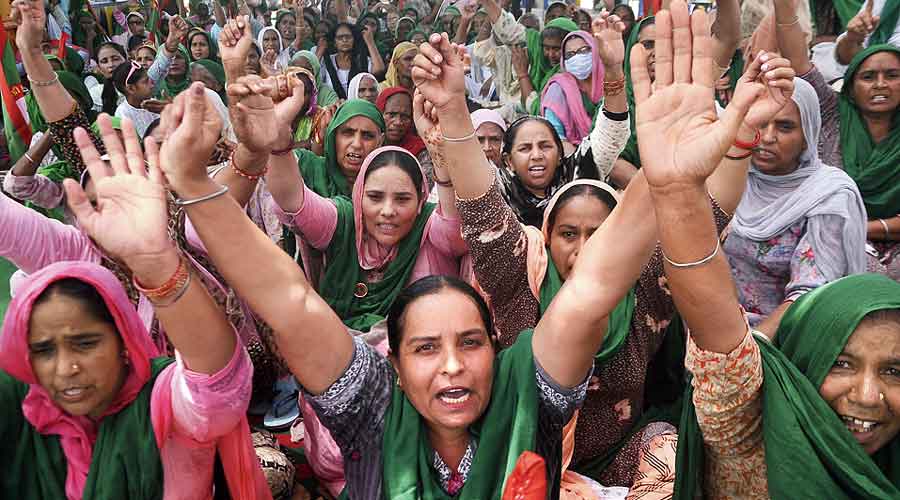 Members of Bharatiya Kisan Union protest in Patiala  on Monday. 