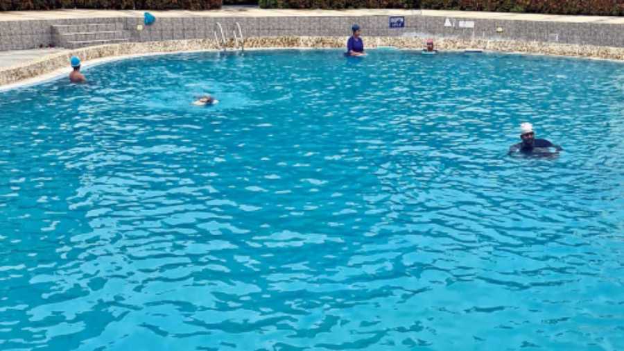 Members take a dip at New Town Business Club on Tuesday