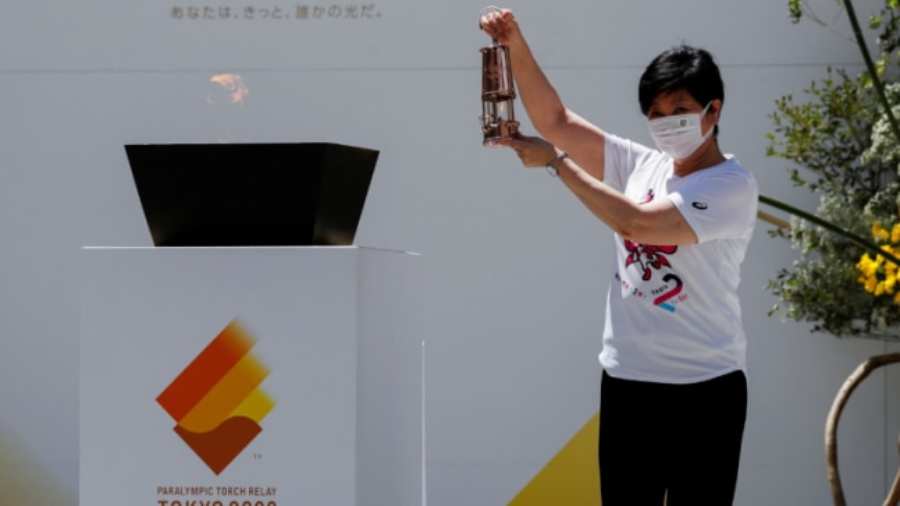 The Paralympic flame during a lowkey ceremony in Tokyo.