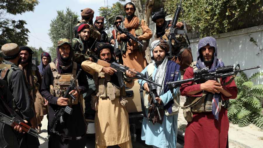 AFGUNNED: Taliban fighters after they took over Kabul 