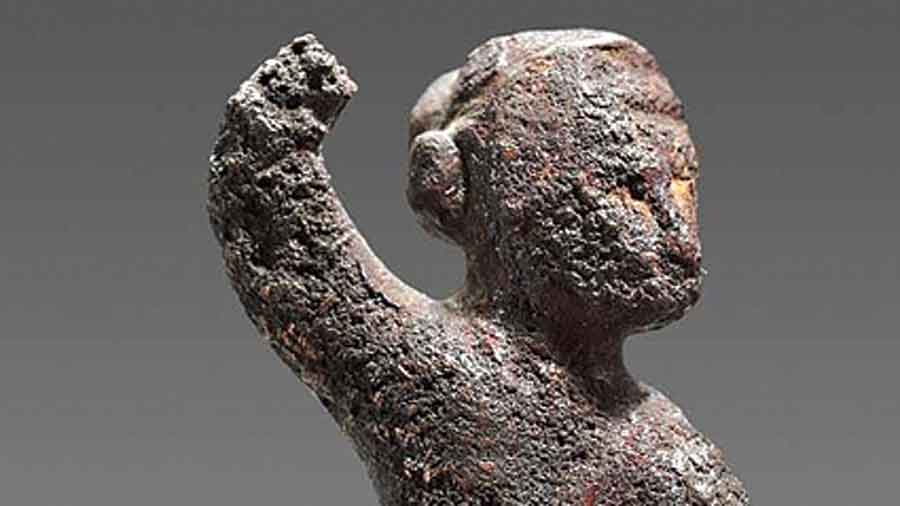 A bronze sculpture of a male spear-thrower found in Chanhiyun Jo Daro, Indus Valley 