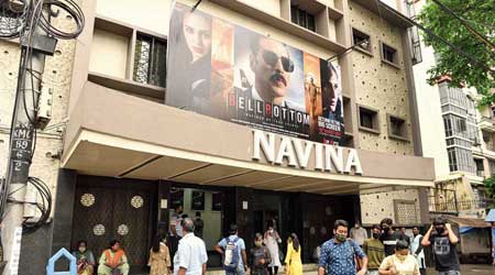 People outside Navina Cinema on Friday.