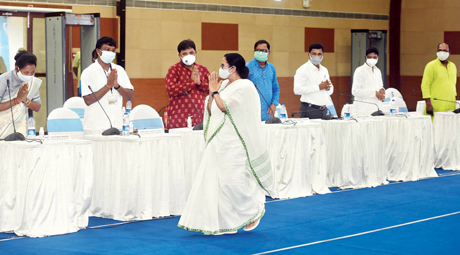 Mamata Banerjee at the meeting of the West Bengal Tribal Development Council on Monday.