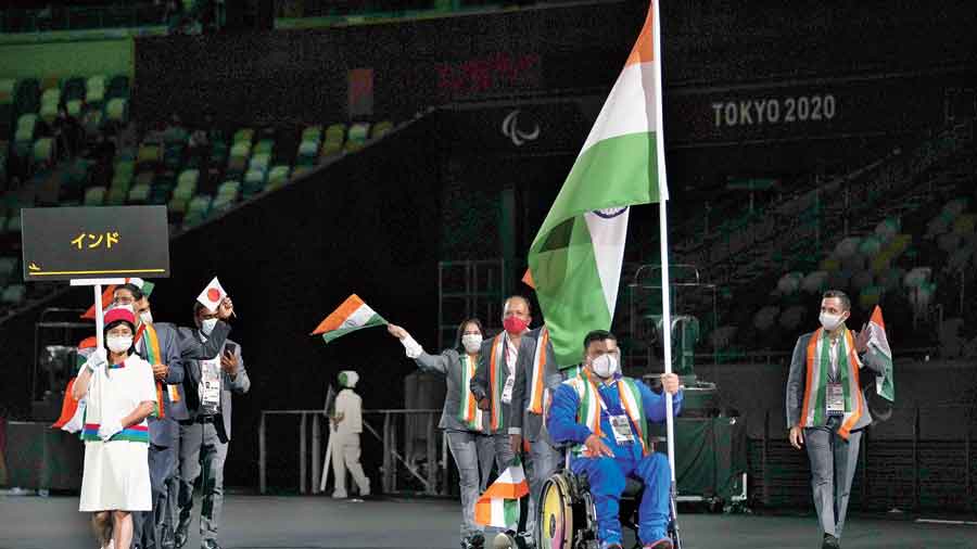 Athletes from India enter the stadium during the opening ceremony of the 2020 Paralympics at the National Stadium in Tokyo on Tuesday. 