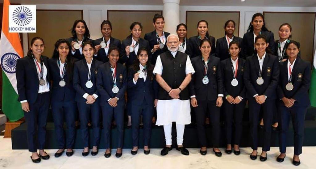Prime Minister Narendra Modi with the Indian women's hockey team.