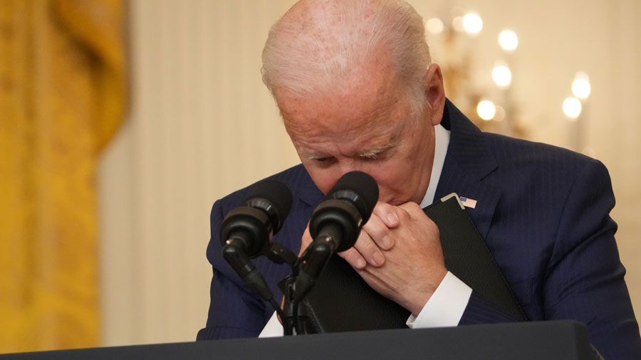 President Joe Biden listens to a question from a reporter at the White House in Washington on Thursday, Aug. 26, 2021, while speaking about the unfolding situation in Afghanistan, after explosions caused casualties and rattled the area outside Hamid Karzai International Airport in Kabul.