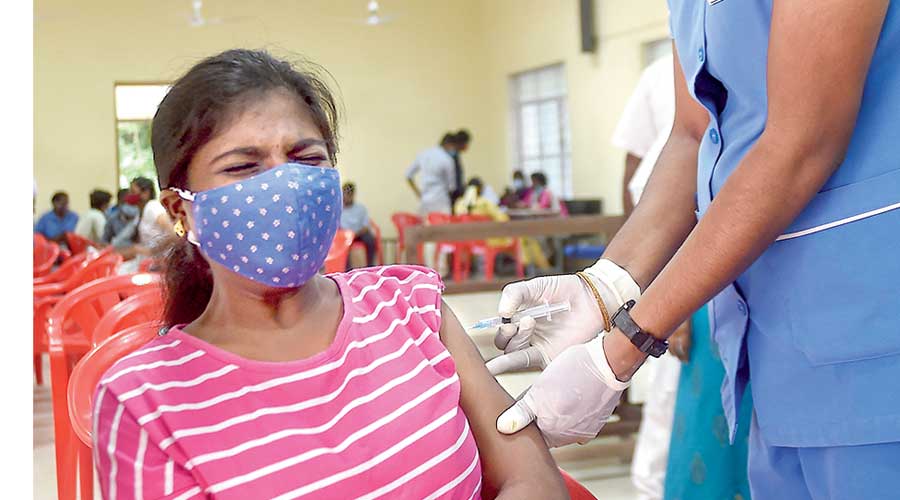 A lady getting vaccinated against Covid-19