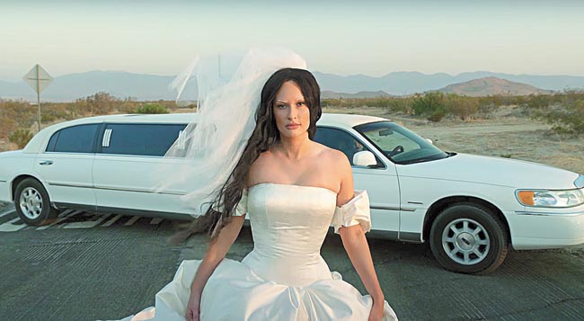 Instead of going into a self-pity mode wearing a wedding dress, Kacey Musgraves takes control of her narrative in the film that comes with her forthcoming album, Star-Crossed
