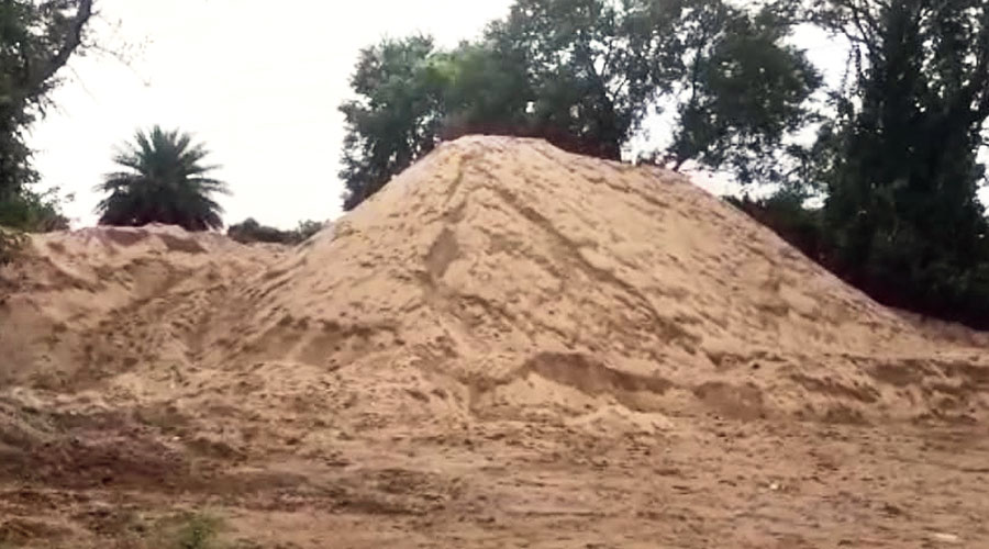 Smuggled sand stockpiled at Pandaveswar, West Burdwan, on Monday. 