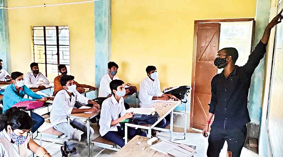 A teacher takes a class at the school.