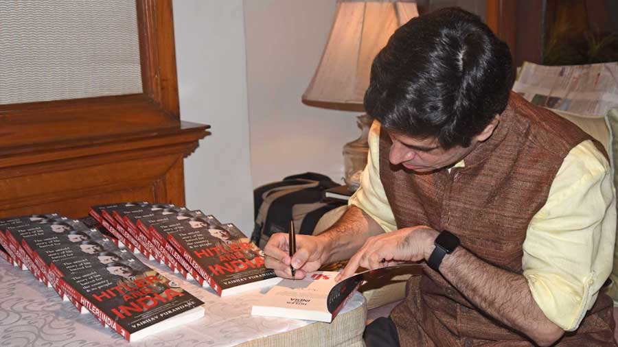 Vaibhav Purandare signs copies of his book, 'Hitler and India' 