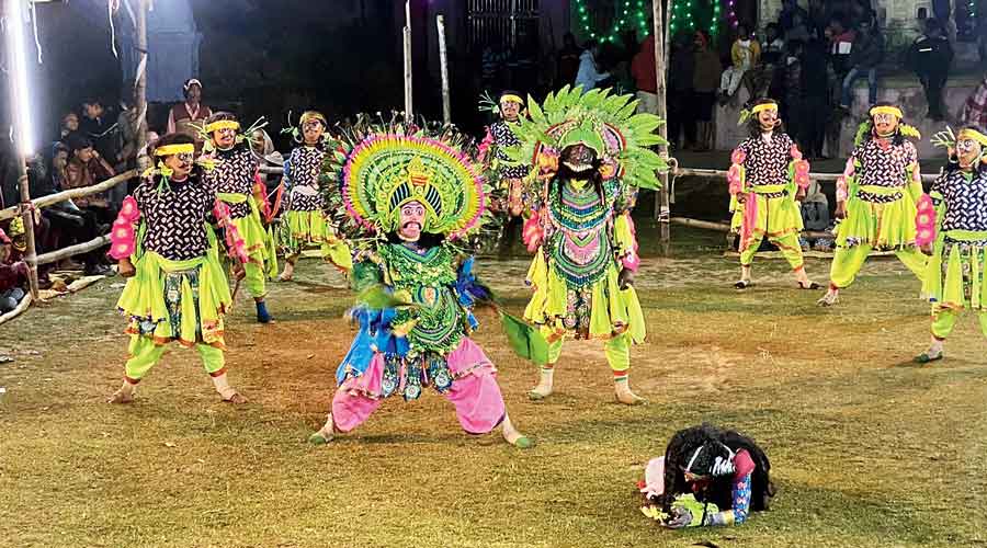 Chhau dancers perform at Barabazar Rajbari complex in Purulia.