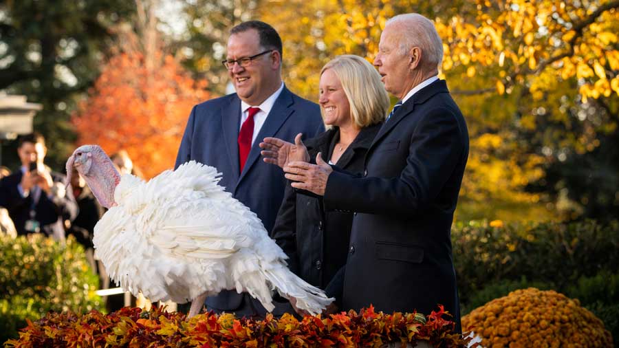President Joe Biden pardons a turkey named Peanut Butter during the 74th National Thanksgiving Turkey Presentation at the White House in Washington on Friday, Nov. 19, 2021.