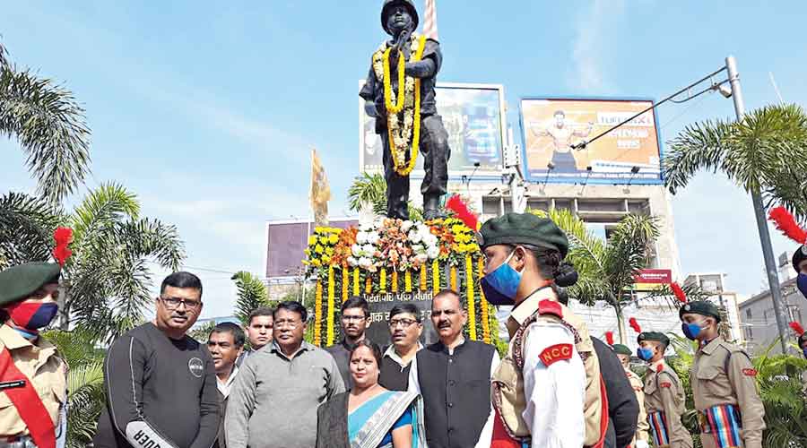 Jharkhand food and finance minister Rameshwar Oraon (second from left, in grey jacket) near the statue of soldier Albert Ekka, who was slain in the 1971 Indo-Pak war, in Ranchi on Friday.