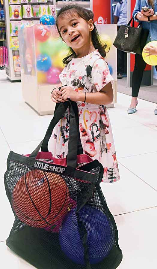 Indira Singh, who is two-and-a-half years old, was captured filling her shopping bag with some colourful balls. Rs 195 for each.