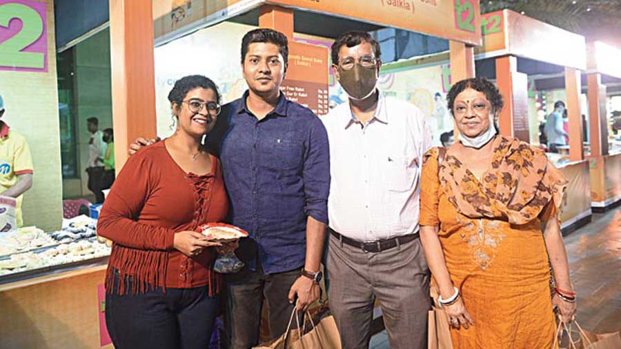 “We just bought Malai Patishapta and this is our first stop. We will visit many other stalls to experience more, but so far this has been a really good and the experience is fun too,” said Aakash Banerjee (second from left) who was there with his family.