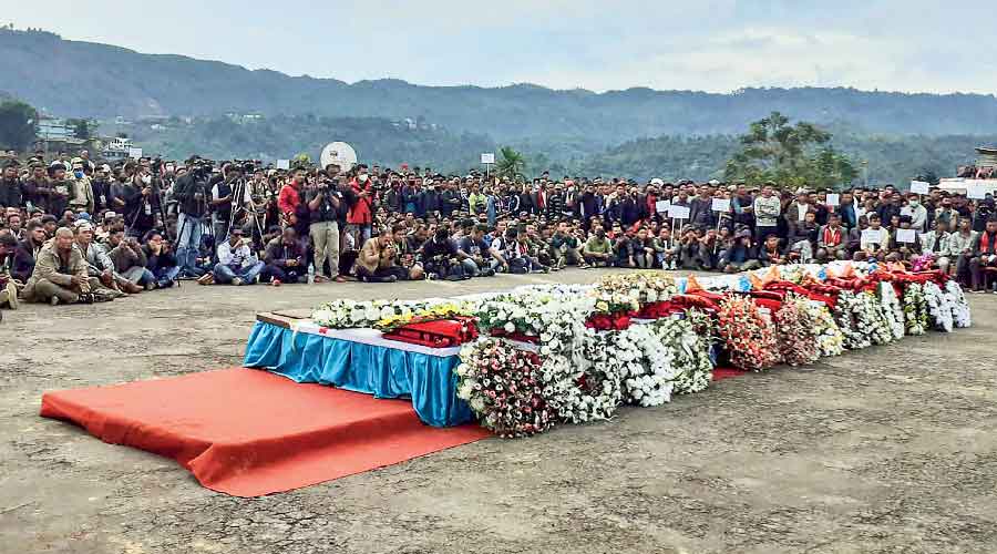 Coffins of 13 people, who were killed by the armed forces in two bursts on Saturday evening, during their funeral in Nagaland’s Mon district  on Monday