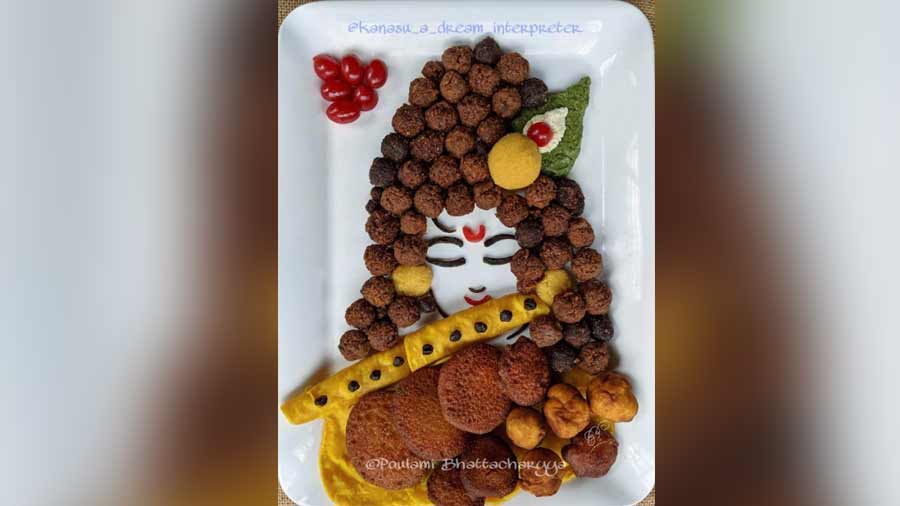An edible artwork of Krishna made with all things that Krishna is known to enjoy eating, such as ‘taaler bora’, ‘taaler luchi’ and ‘narkel nadu’
