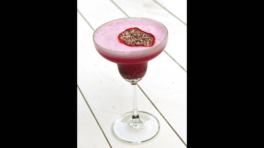 Dragon Fruit Gin Sour: This vibrantly colored drink tastes just as good.  The delicacy of the gin and the fruitiness of the dragon fruit blend perfectly with the egg white mousse (can be made without, on request) adding a layer to the drink.  775 rupees