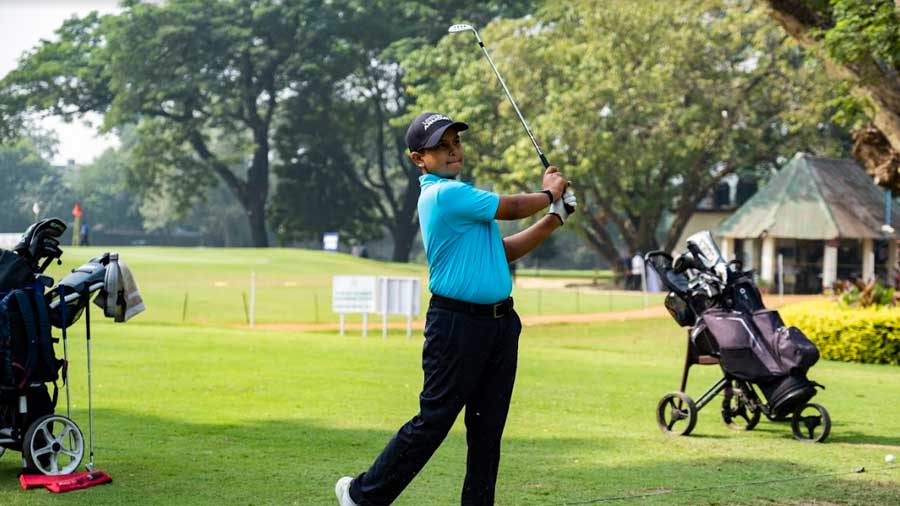 Anshul follows through after an impeccable tee shot