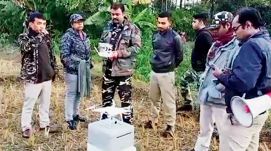 Foresters ready the drone camera on Friday to try and  trace the bear sighted at the Good Hope tea estate in Malbazar, Jalpaiguri.