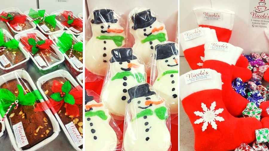 (L-R) Christmas cake, Snowmen chocolates and stockings stuffed with festive goodies.