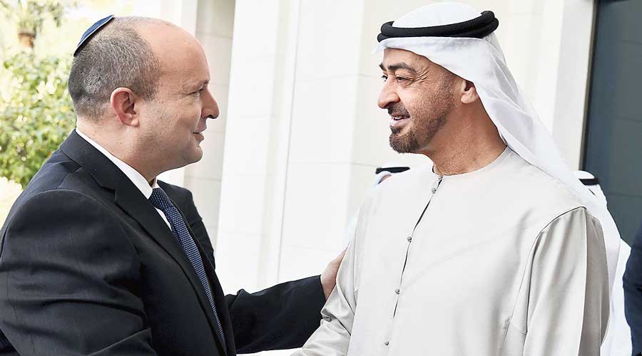 Prime Minister Naftali Bennett (left) with Abu Dhabi Crown Prince Sheikh Mohammed bin Zayed at his private palace in Abu Dhabi on Monday. 