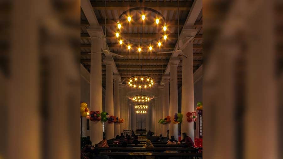 The illuminated interiors of the church during a past Christmas Day