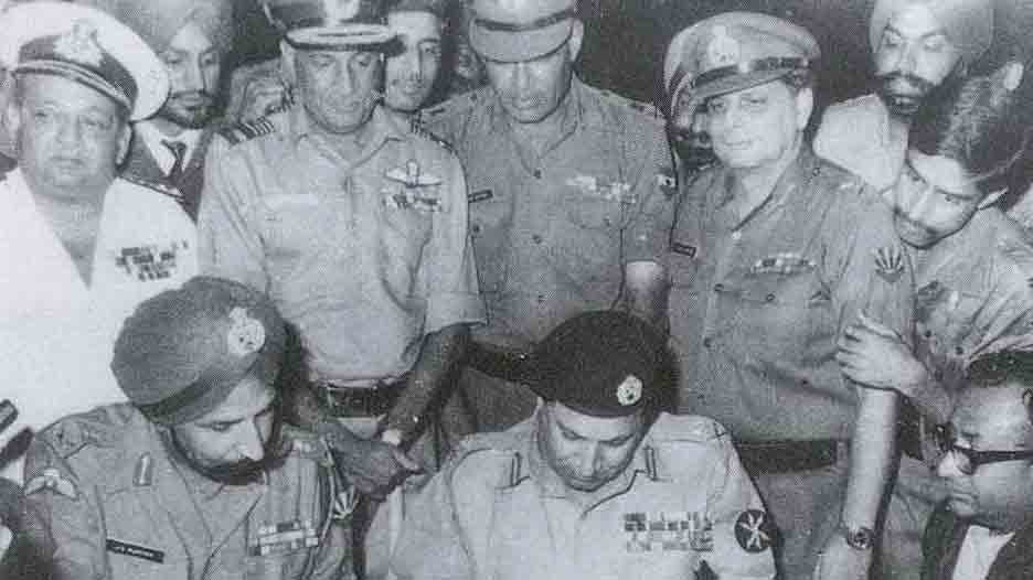 Pakistan Army's General AAK Niazi (right) surrenders before the Indian army bringing an end to the 1971 war