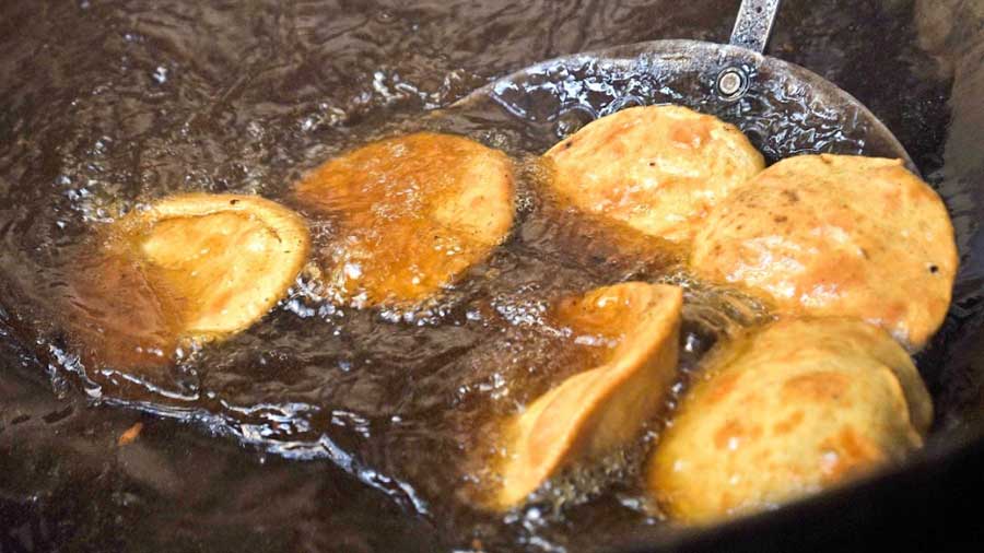 Few things work as well to form a crowd outside shops as the scent of ‘kochuris’ being fried in the morning