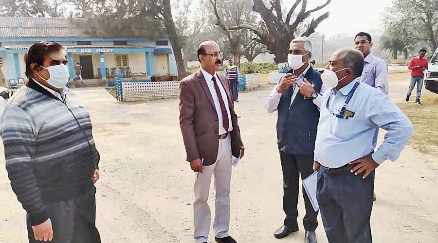 Officials of the Airports Authority of India at the Malda airport with officials of district administration on Monday. 
