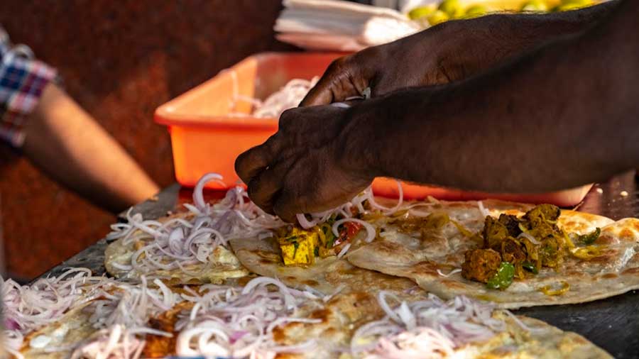 Mouthwatering rolls being readied at Hot Kathi Roll