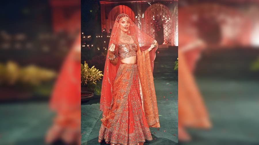 Deepti Gujral in bridal red