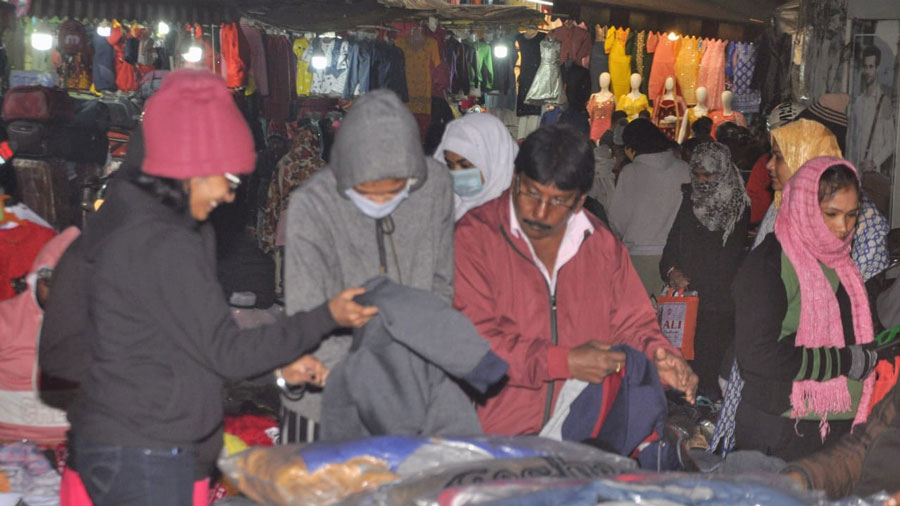 People busy buying woollens at Sakchi in Jamshedpur on Tuesday night. 