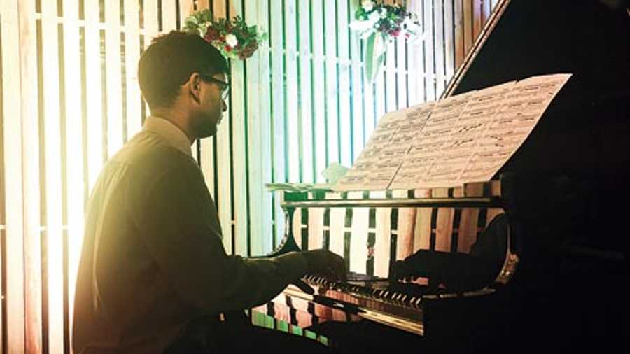 Kanishka from Calcutta who is studying at a conservatory in Italy was at the keyboard accompanying the students in their carol performance.