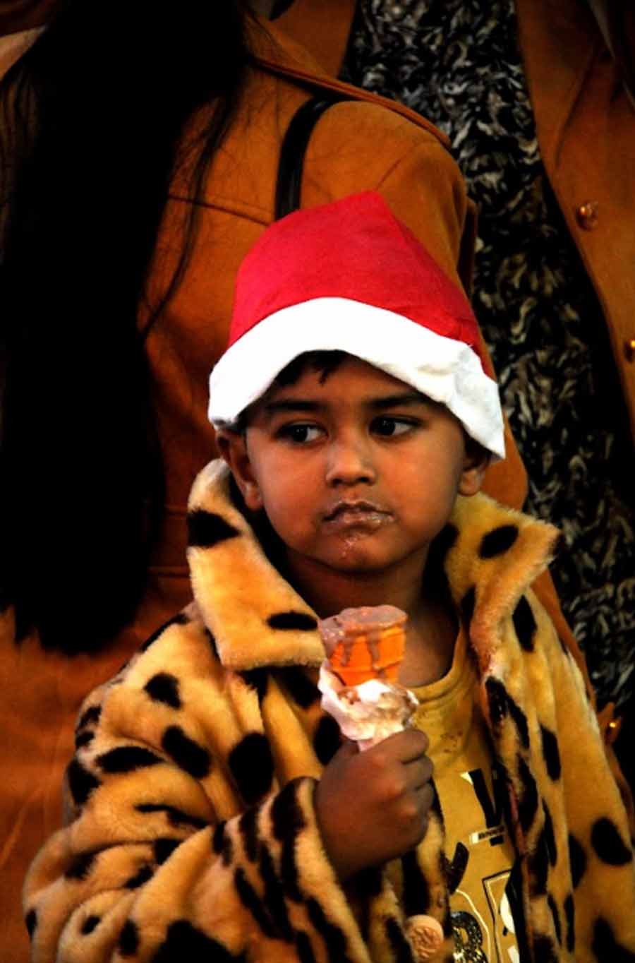 Kolkata winters may not rankle your bones, but evenings are decidedly chilly and everyone is out in their winter cosies. But then who can stop a child from enjoying their ice- cream, fluffy coat and winter chill notwithstanding. It’s Christmas time after all!