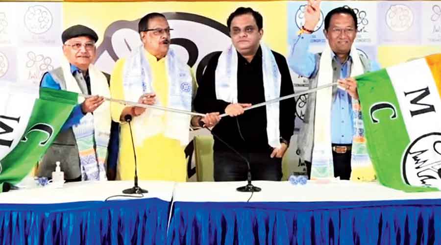 Binay Tamang and Rohit Sharma join Trinamul in the presence of state ministers Moloy Ghatak and Bratya Basu in Calcutta on Friday.