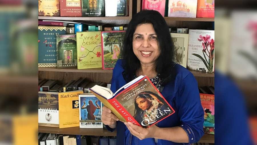 Author Chitra Banerjee Divakaruni with a copy of her latest novel, 'The Last Queen'