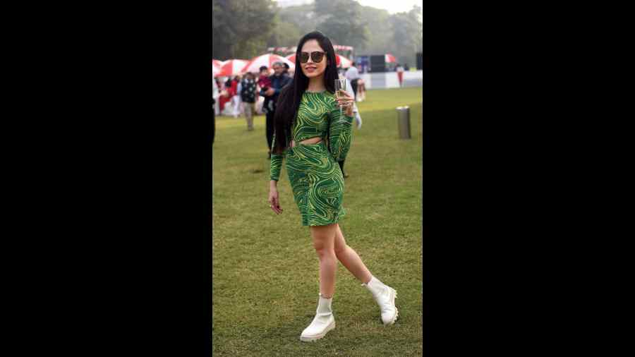 We loved how Malobika Banerjee paired her patterned green Zara dress with white sneakers for a comfy look.