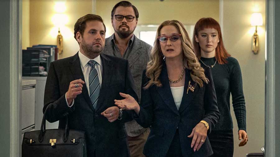 Clockwise from left: Jonah Hill, Leonardo DiCaprio, Jennifer Lawrence and Meryl Streep in a still from the film 