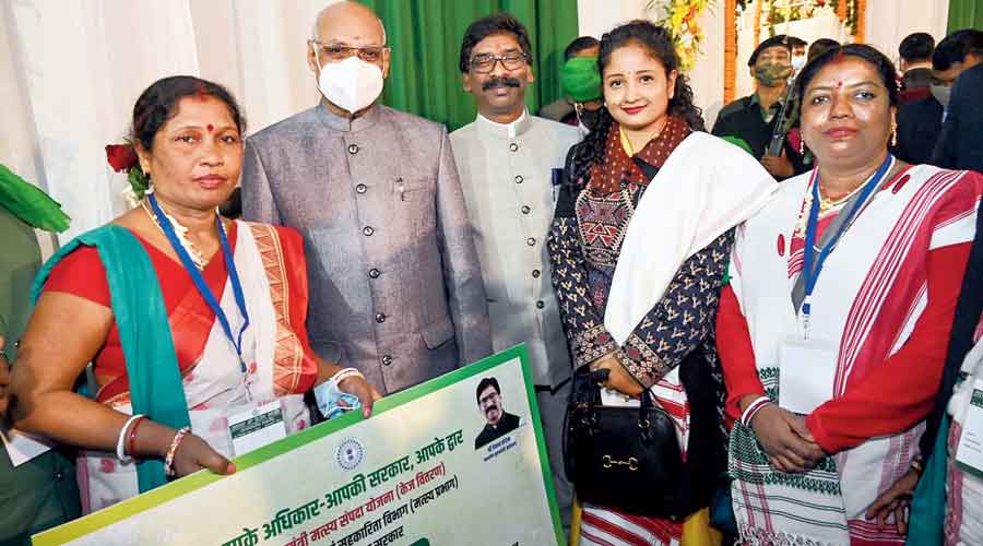   (From left)  Governor Ramesh Bais and Hemant Soren along with the chief minister’s wife at the inauguration of schemes on the occasion of the second anniversary of the UPA-led government at the Morabadi Ground in Ranchi.