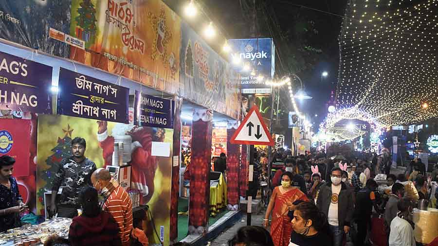 Visitors throng Pous Parbon O Christmas Utsav. 