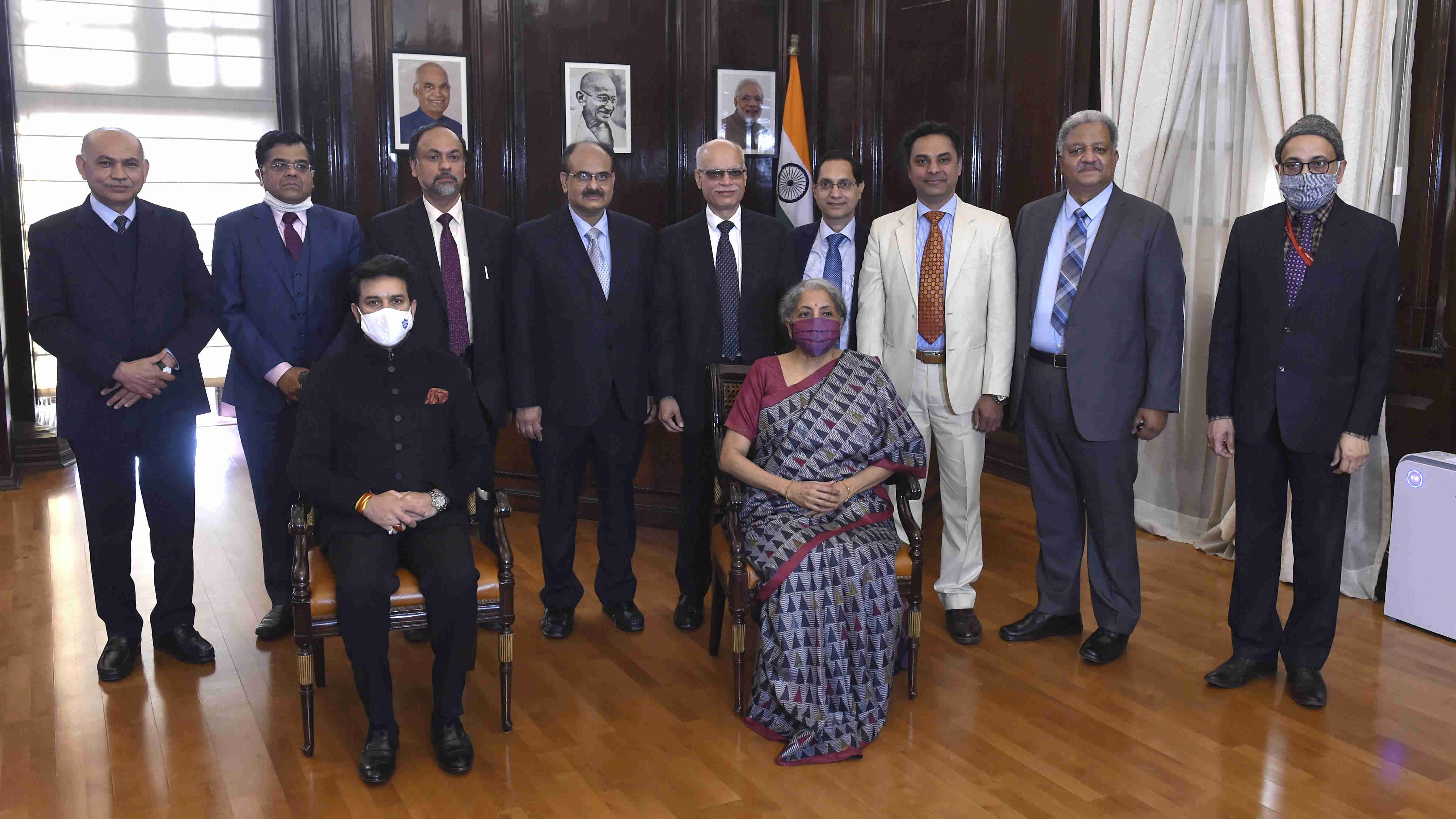 Finance Minister Nirmala Sitharaman, MoS for Finance Anurag Thakur, Chief Economic Advisor Krishnamurthy Subramanian and others pose for a photograph during the final touches of Union Budget 2021-22, at Finance Ministry in New Delhi, Sunday, Jan. 31, 2021. 
