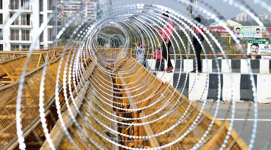 A barbed wire fence set up at the Ghazipur border on Sunday