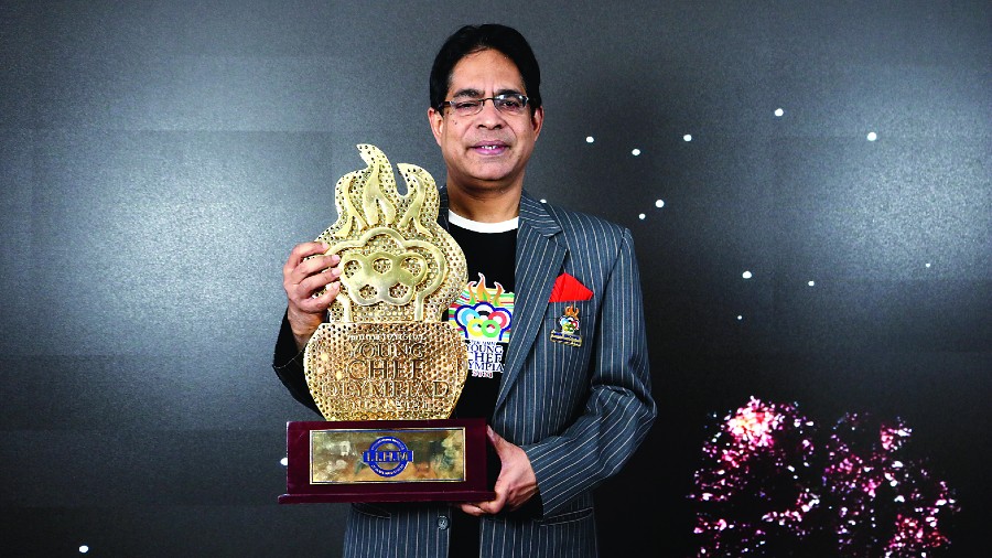 Unveiling the trophy on the opening day, Suborno Bose, chairman, IIHM Young Chef Olympiad