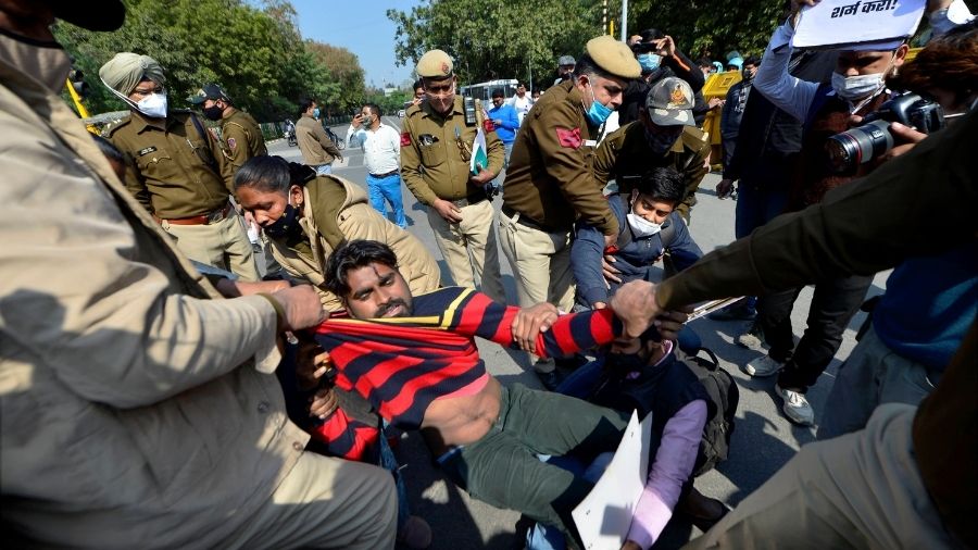Police detain left-wing activists protesting during farmers' 'chakka jam' movement, at Shaheed Park in New Delhi, on Saturday.
